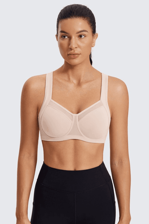 Side angle of nude full coverage sports bra showing smooth molded cups and extended band - MissFine