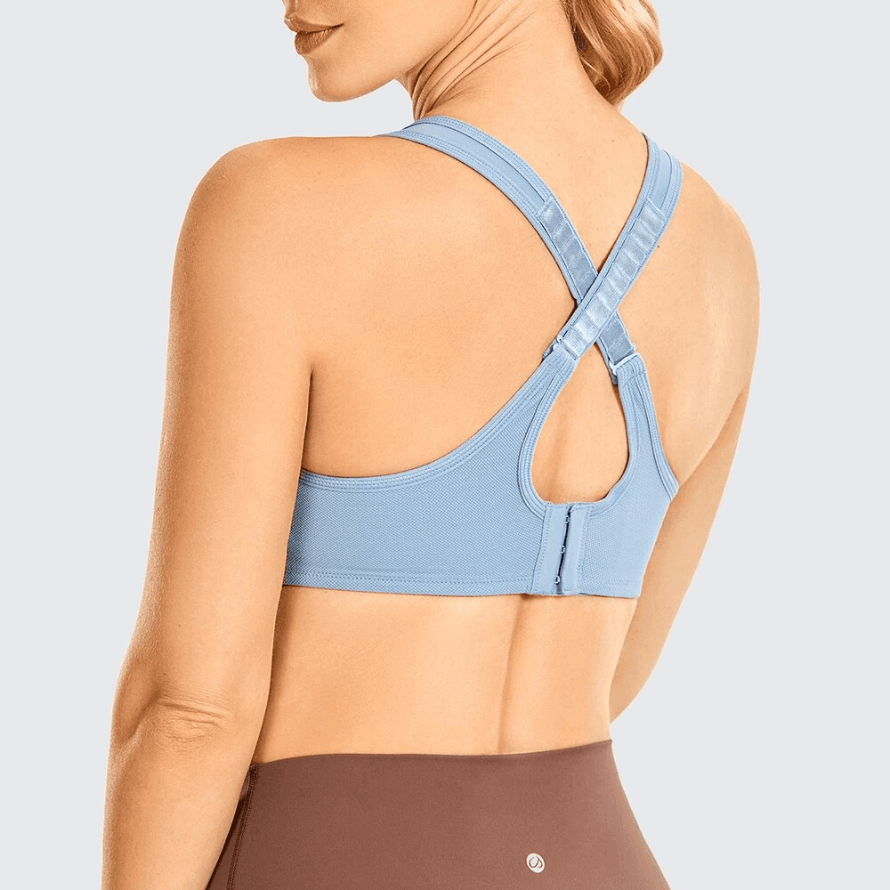 Side angle showing molded seamless cups and wide elastic underband on blue sports bra - MissFine