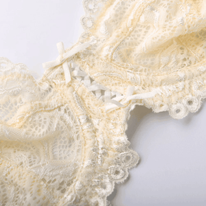 Front view of light cream seamless cup bra with delicate lace trim and underwire support - MissFine