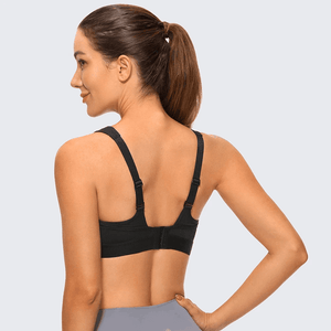 Rear close-up of cross-back strap detail and wireless padded cups on black sports bra - MissFine