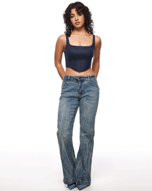 Close-up of molded cups and princess seams on corset-style bra top in bright pink - MissFine