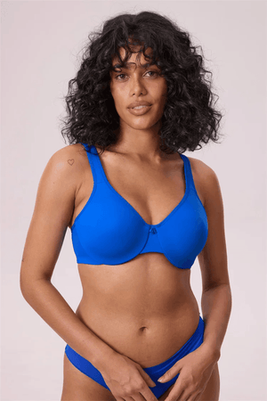 Close-up of wide cushioned shoulder straps and seamless molded cup edge on blue support bra - MissFine
