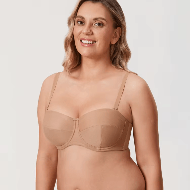 Angled view showing underwired cups and wide band of nude strapless seamless bra - MissFine