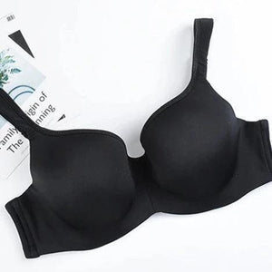 Side angle of gray seamless molded cup bra showing wide-set adjustable straps and back closure - MissFine
