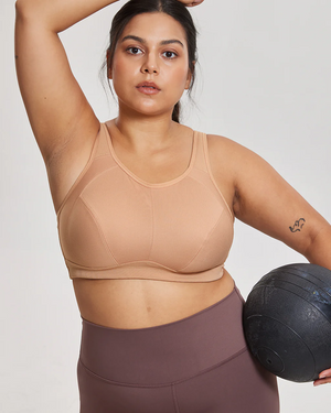 Front view of nude seamless non wired sports bra with wide straps and scoop neckline - MissFine