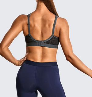 Side angle of black seamless non wired sports bra showing wide supportive straps - MissFine