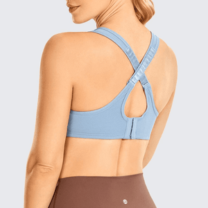 Side angle showing molded seamless cups and wide elastic underband on blue sports bra - MissFine