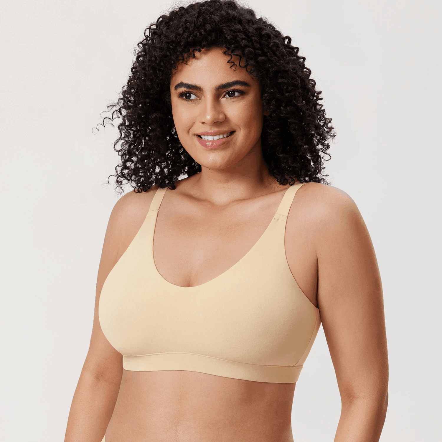 Side angle of black seamless bra showing adjustable shoulder straps and full coverage cups - MissFine