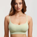 Front view of light sage green seamless non wired bra with ribbed texture and scoop neckline - MissFine