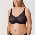 Front view of black wireless full cup minimiser bra with wide straps - MissFine