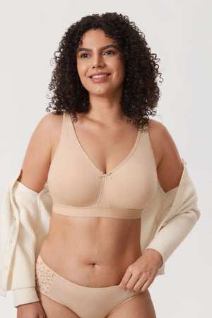 Side angle of cream wireless full cup minimiser bra showing wide underband support - MissFine
