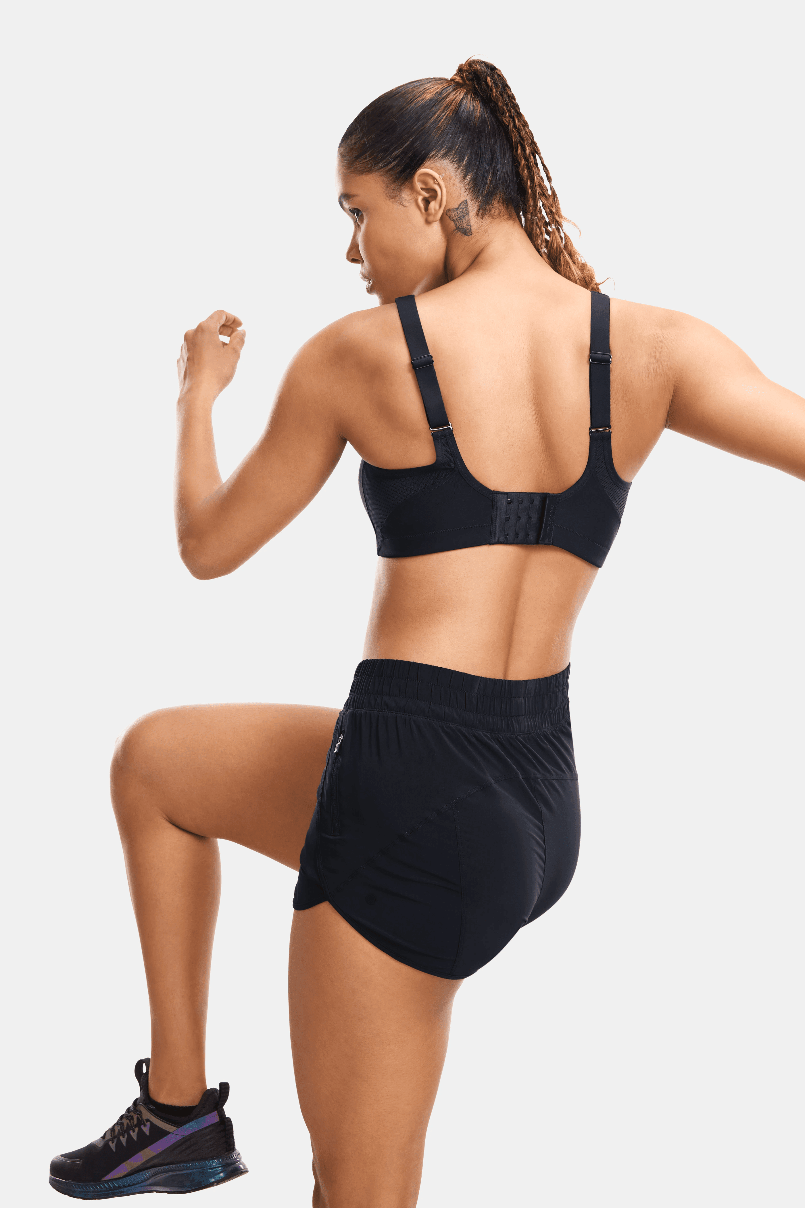 Close-up of ribbed underband and seamless cup detail on nude sports bra - MissFine