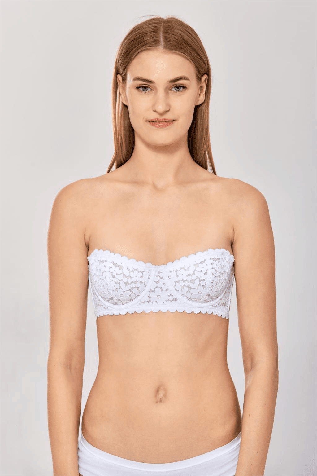 Close-up of floral lace overlay and molded padding on white demi cup strapless bra - MissFine