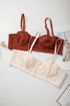 Angled top view of rust and cream lace underwired padded bras with balconette demi cup styling - MissFine