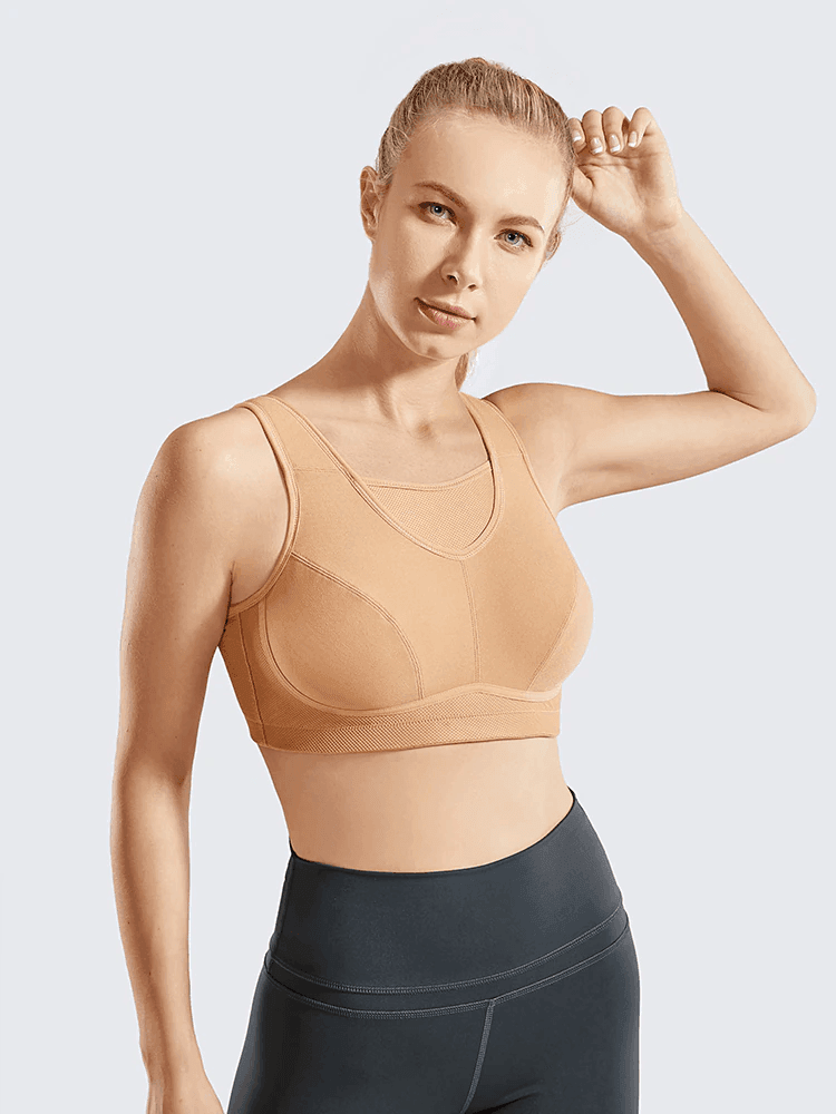 Front view of nude full coverage sports bra with seamless molded cups and wide straps - MissFine