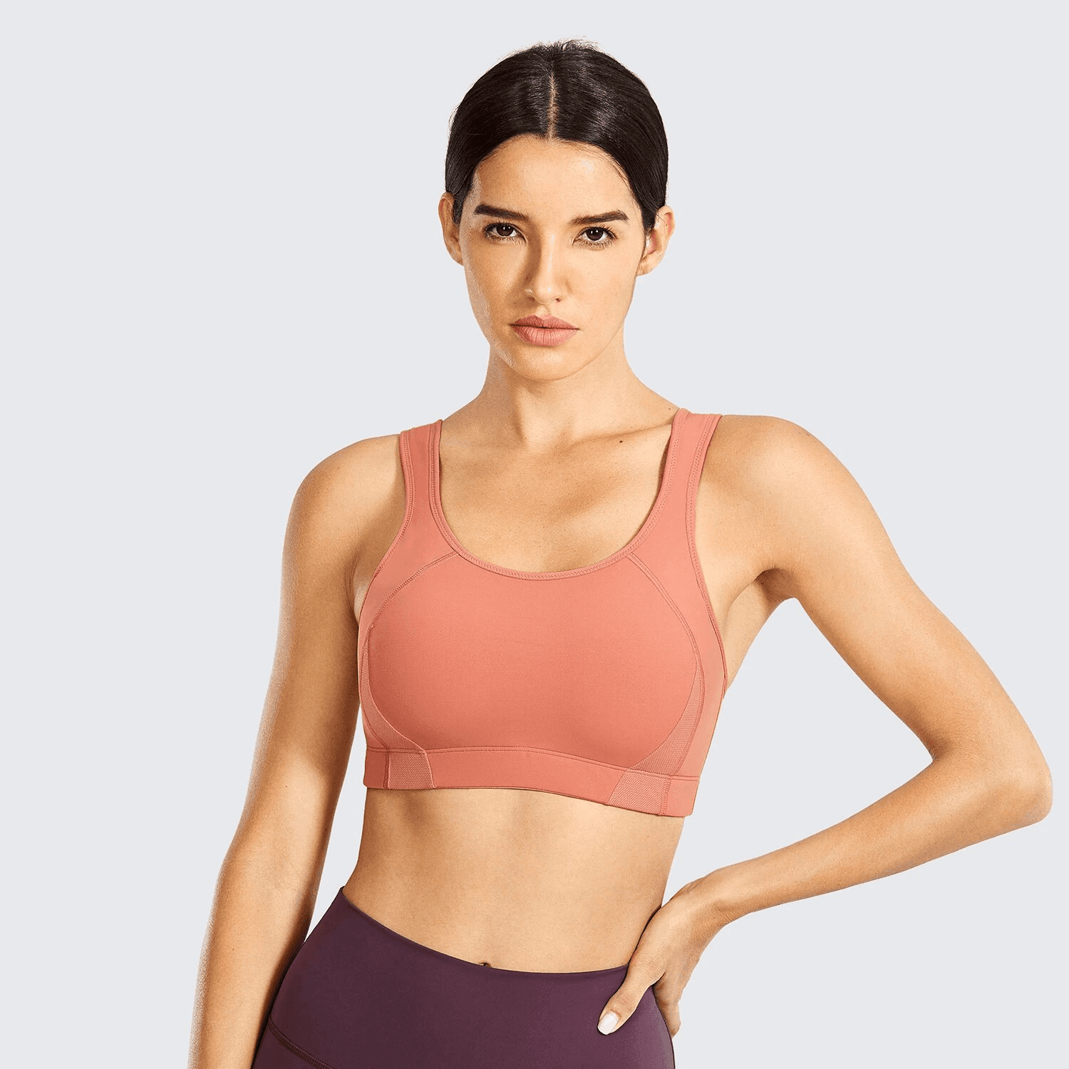 Side angle of pink pull-on sports bra showing full coverage cups and smooth band - MissFine