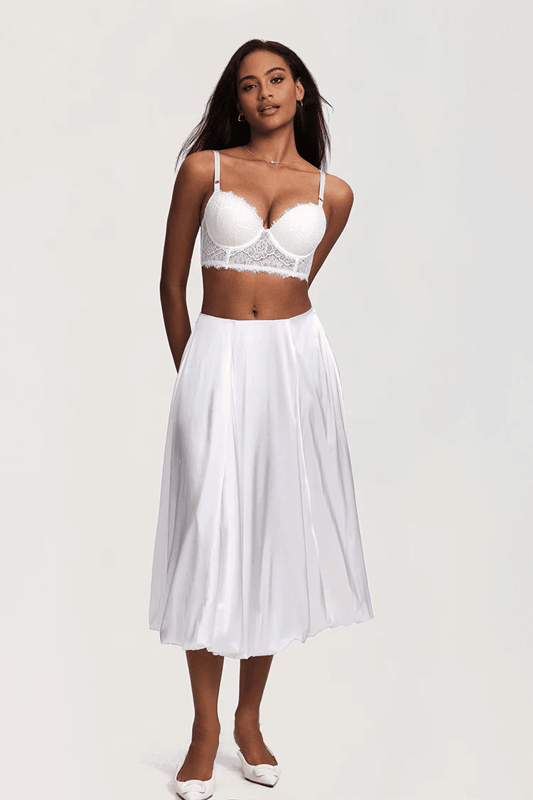 Close-up of white longline plunge bra with molded cups and delicate lace overlay on cups and band - MissFine