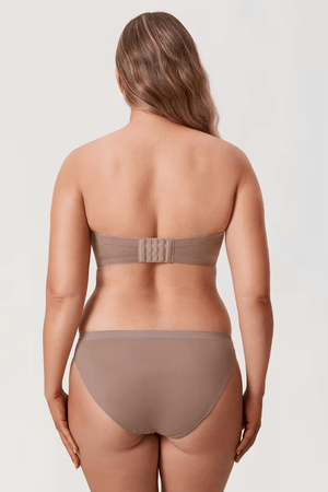 Close-up of molded cup edge and convertible strap attachment on strapless bra - MissFine