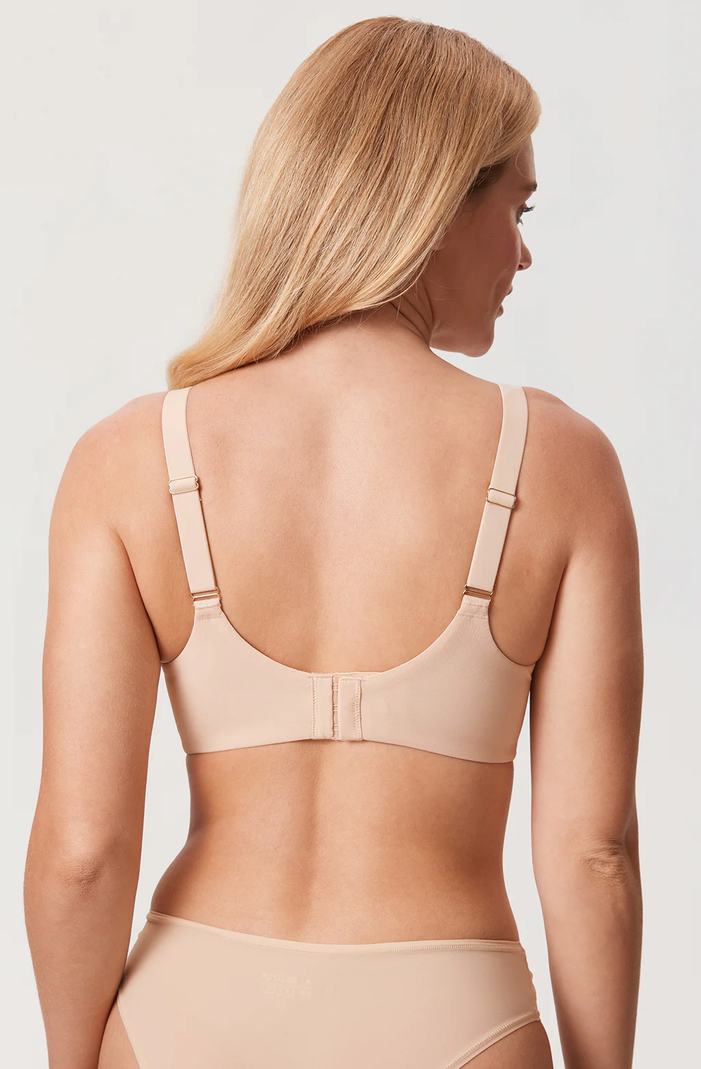 Close-up of molded cup detail on nude seamless underwired bra highlighting smooth, opaque fabric finish - MissFine