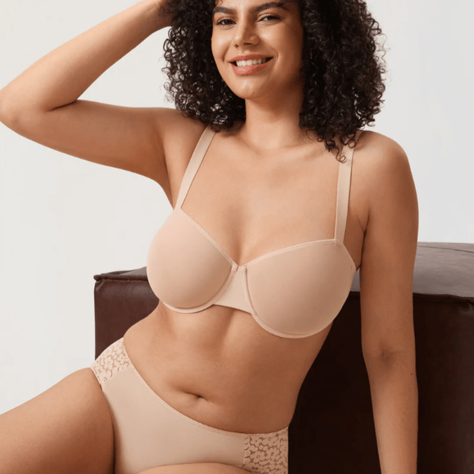 Side angle of nude padded t shirt bra showing seamless molded cups and adjustable straps - MissFine
