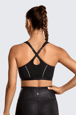 Close-up of front zipper and contrast stitching on black padded sports bra - MissFine