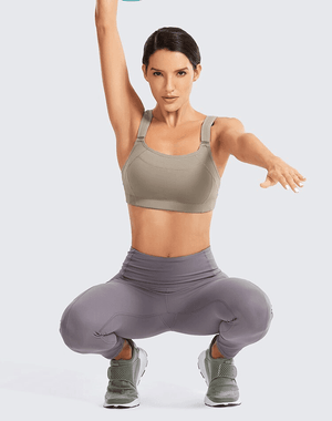 Close-up of technical fabric and smooth molded cup construction on black sports bra - MissFine