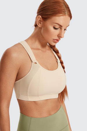 Side angle of nude full coverage sports bra highlighting breathable mesh panels and soft racerback straps - MissFine