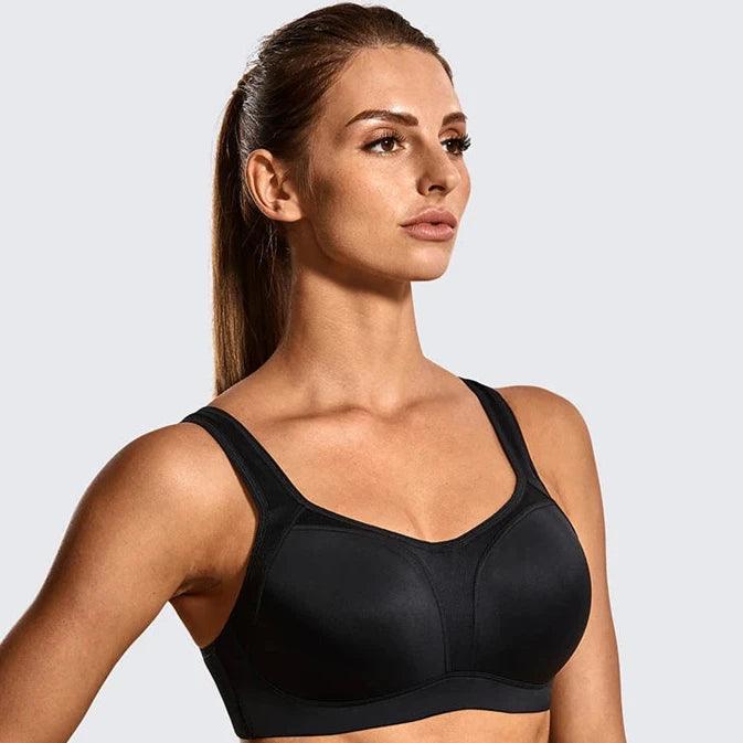 Side angle of black plus size padded sports bra showing molded cups and extended underband - MissFine
