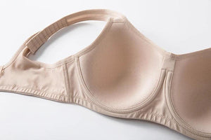 Close-up of beige underwired sports bra highlighting seamless full coverage t-shirt cups - MissFine