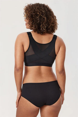 Back view of light pink bra highlighting X-back design and smooth, stretchy fabric band - MissFine