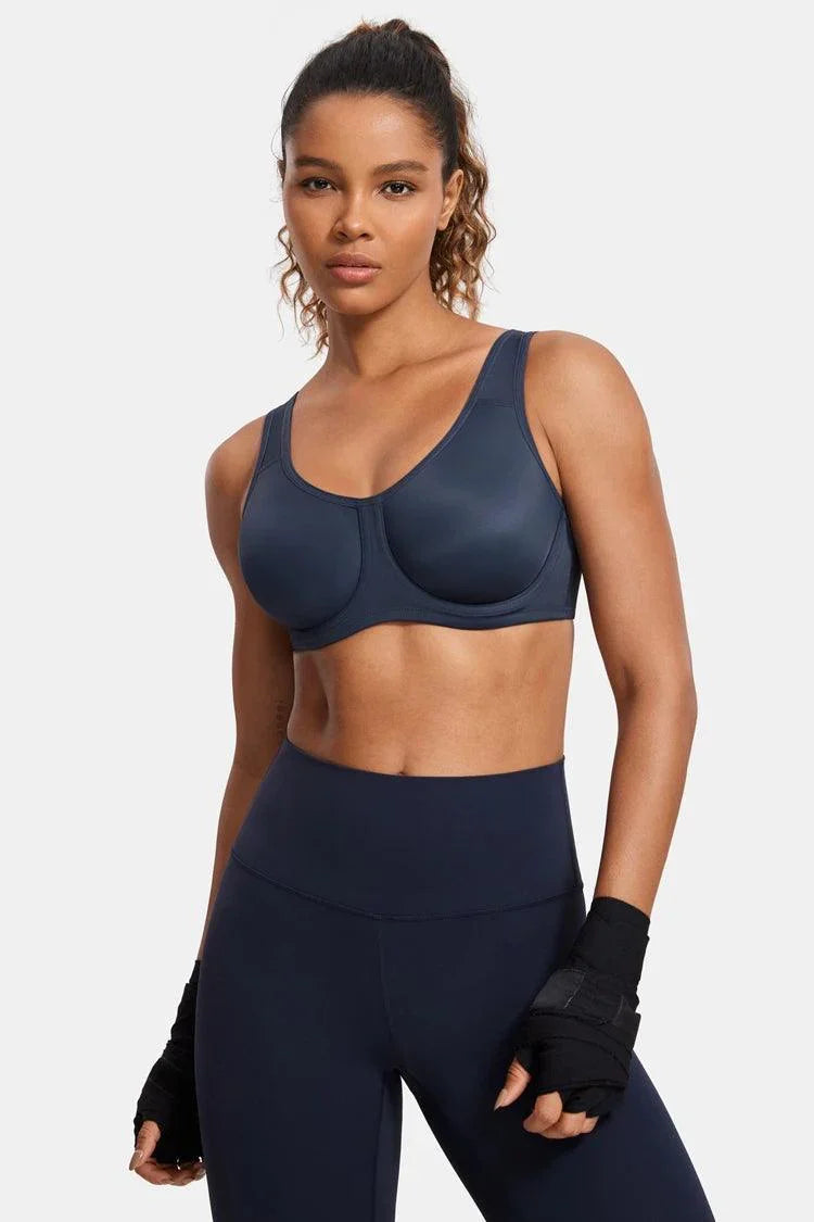 Close-up of molded seamless cup and underwire frame on navy blue full coverage sports bra - MissFine