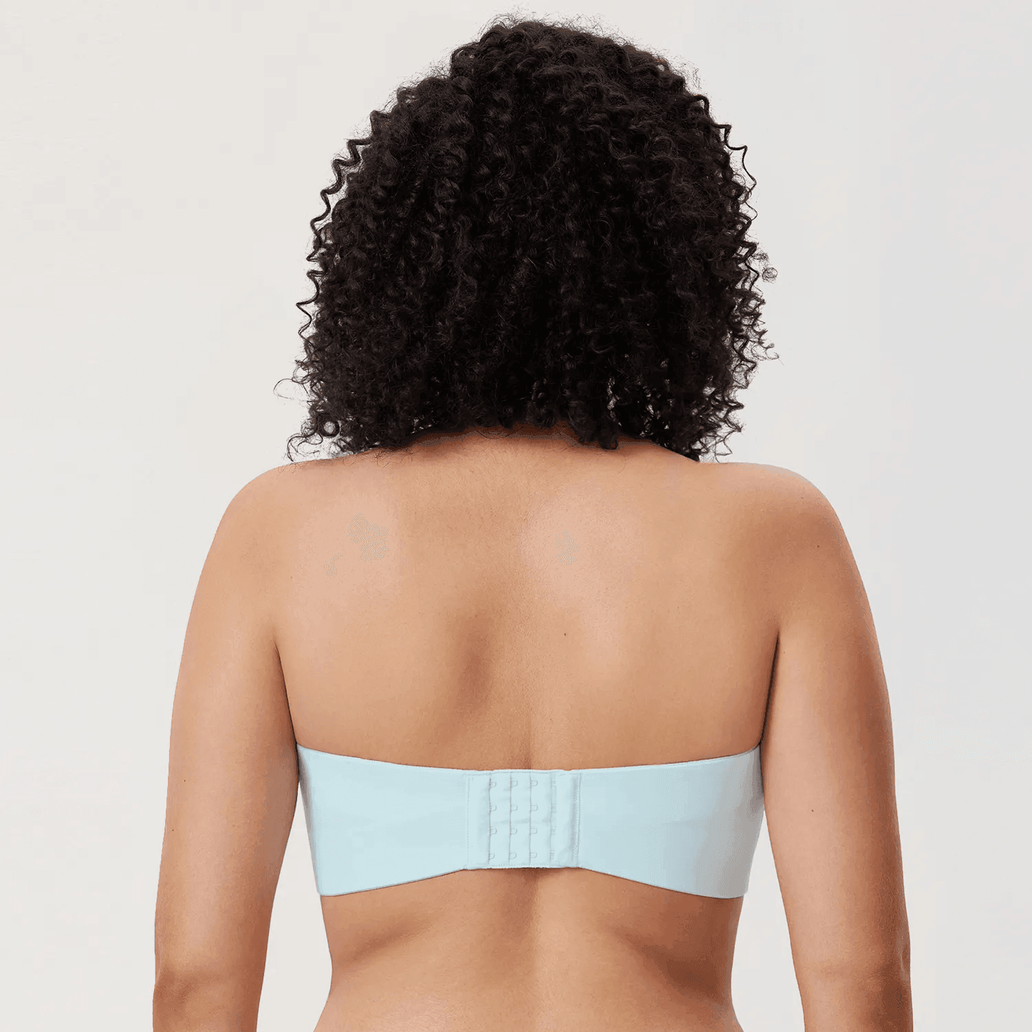 Close-up of seamless molded cups and sweetheart neckline on strapless bra - MissFine