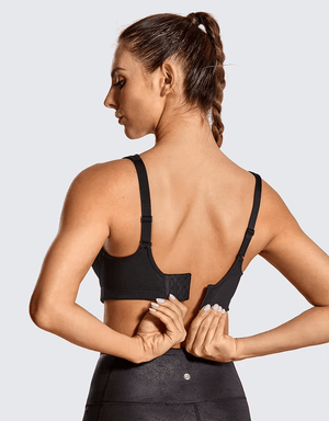 Close-up of molded padded cups and smooth athletic fabric on plus size sports bra - MissFine