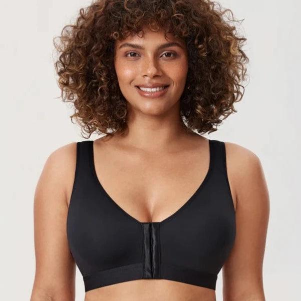 Side angle of light pink front closure bra showing lightly padded seamless cups and straps - MissFine