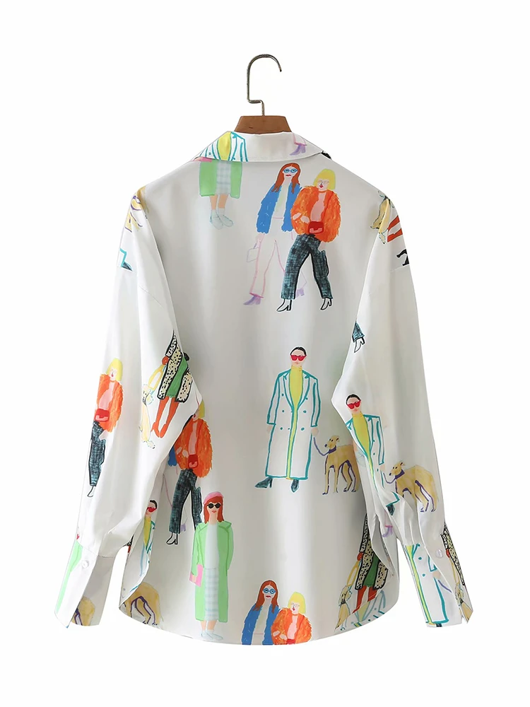 A designer's blouse with lovely illustrations for a trendy feminine look