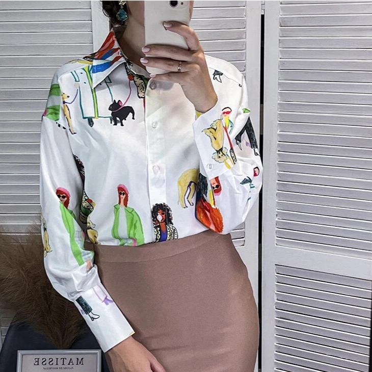 A designer's blouse with lovely illustrations for a trendy feminine look