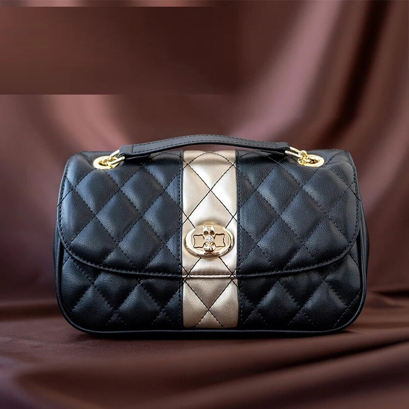 A luxurious bag by a designer from Paris in a golden finish for an elegant woman