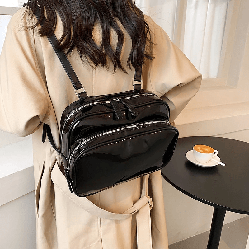 A shiny lacquer style backpack for a sophisticated feminine appearance