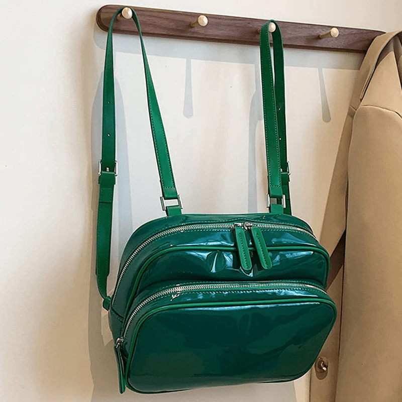 A shiny lacquer style backpack for a sophisticated feminine appearance