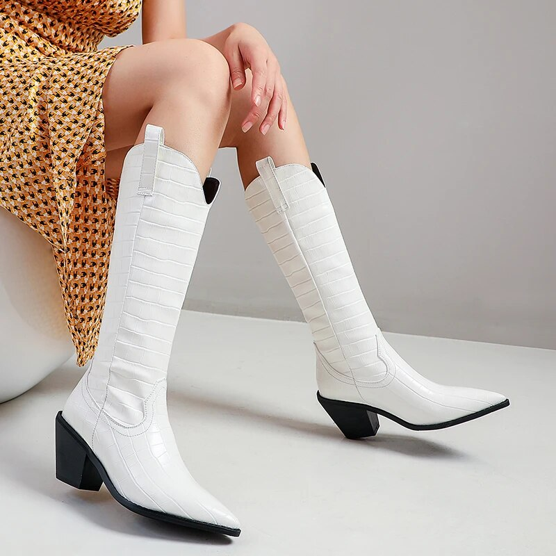 A snake cowboy boot for a woman who wants to show cool style