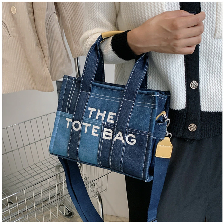 A denim bag perfect for carrying by hand or on the shoulder for a trendy look