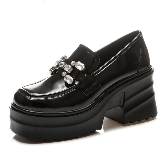 Moccasin platform in a zircon finish by a Spanish designer for a tall studded look