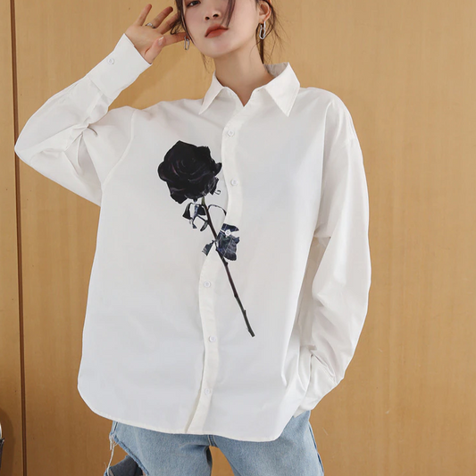 Perfect boyfrand blouse with black rose detailing for a magnetized look