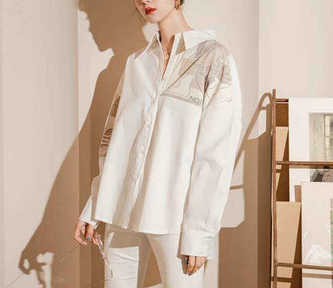 Button-down shirt combined with delicate feminine painting for a mesmerizing look